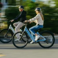 Riders cruising through Kingston on Kingston Cyclery e-bikes